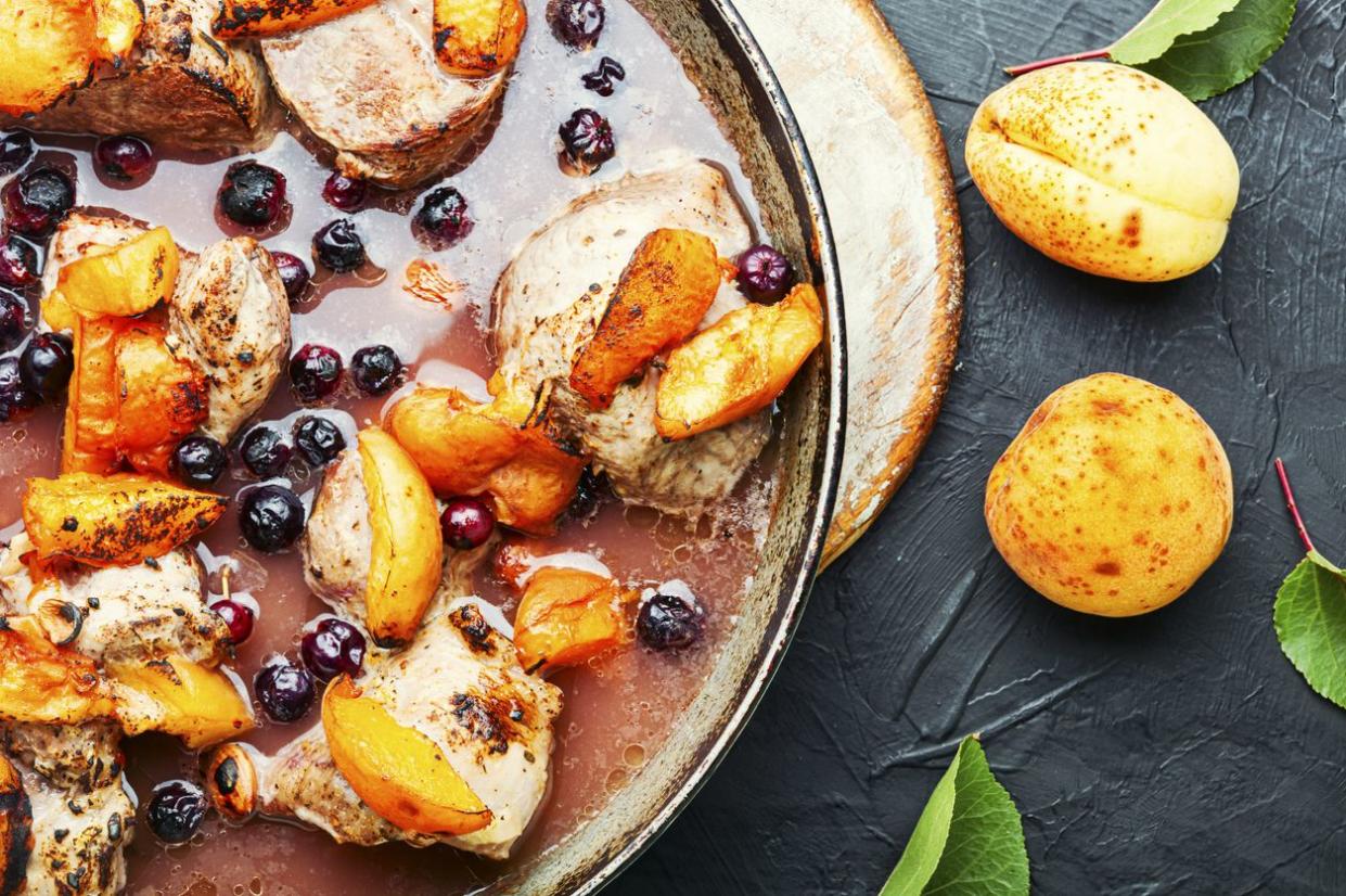 Baked pork in red wine with apricot and blackcurrant.