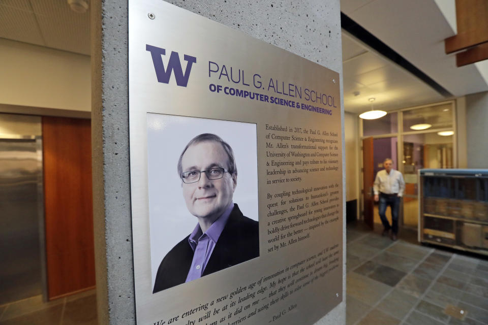 A portrait of Paul Allen stands on a wall at the Paul G. Allen School of Computer Science & Engineering at the University of Washington, Monday, Oct. 15, 2018, in Seattle. Allen, who co-founded Microsoft with his childhood friend Bill Gates, has died. He was 65. Allen's company Vulcan Inc. said in a statement that he died Monday. Earlier this month Allen said the cancer he was treated for in 2009, non-Hodgkin's lymphoma, had returned. Allen, who was an avid sports fan, owned the Portland Trail Blazers and the Seattle Seahawks. (AP Photo/Elaine Thompson)