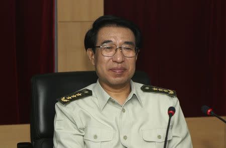 Then member of Central Military Commission Xu Caihou attends a meeting in Changchun, Jilin province July 14, 2004. Chinese President Xi Jinping struck a key blow in his fight against pervasive graft on Monday with the expulsion from the Communist Party of the former high-ranking military commander who had risen to near the very apex of power in China. REUTERS/Stringer