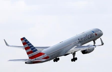 An American Airlines Boeing 757 aircraft takes off at the Charles de Gaulle airport in Roissy, France, August 9, 2016. REUTERS/Jacky Naegelen