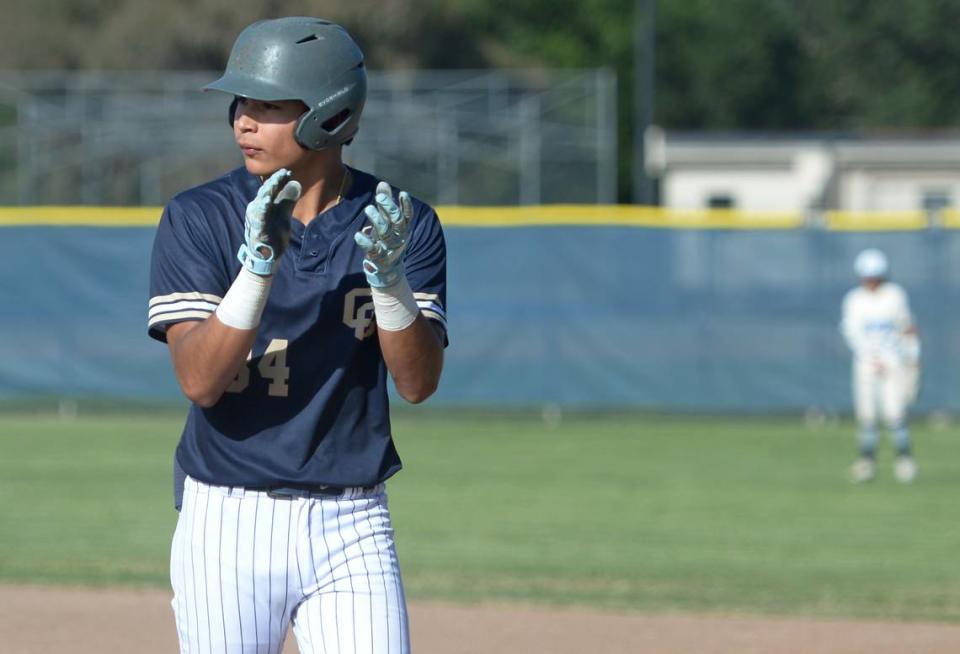 Central Catholic’s Adrian Garcia celebrates a single against Oakmont High in the CIF Northern California Division III Regional Championship in Roseville, Calif. on Saturday, June 1, 2024.