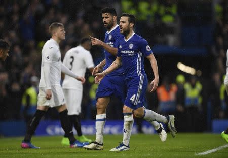 Britain Football Soccer - Chelsea v Swansea City - Premier League - Stamford Bridge - 25/2/17 Chelsea's Diego Costa celebrates scoring their third goal with Cesc Fabregas Action Images via Reuters / Tony O'Brien Livepic