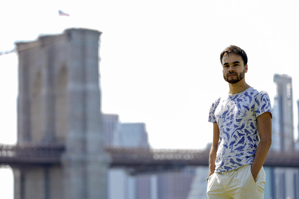 Research engineer Teven Le Scao, who helped create the new artificial intelligence language model called BLOOM, poses for a photo, Monday, July 11, 2022, in New York. (AP Photo/Mary Altaffer)