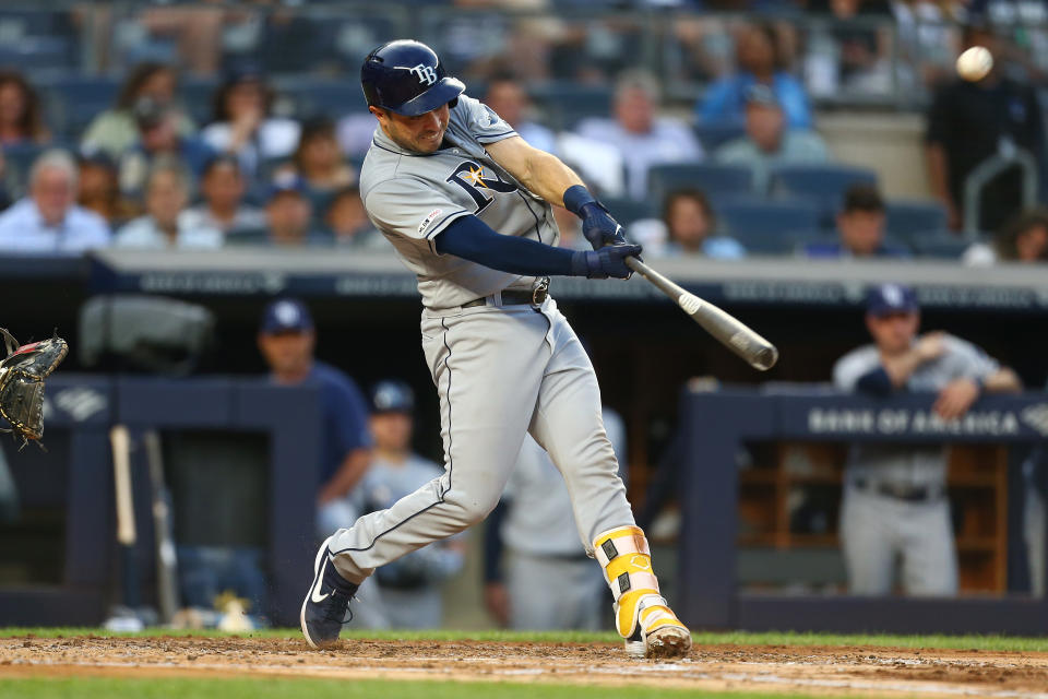 NEW YORK, NEW YORK - JULY 15:  Travis d'Arnaud #37 of the Tampa Bay Rays connects for his second solo home run of the game in the third inning against the New York Yankees at Yankee Stadium on July 15, 2019 in New York City. (Photo by Mike Stobe/Getty Images)