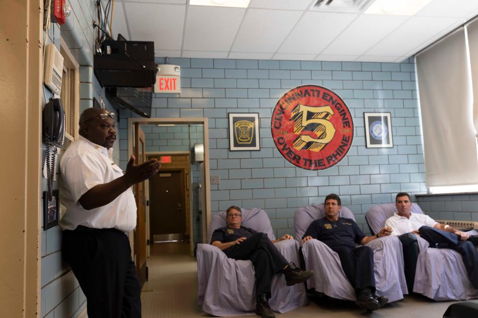 Former Cincinnati Fire Chief Michael Washington Sr. visits Engine 5 in 2021 shortly after he was hired as chief. Washington was fired earlier this year and the city is searching for his replacement.