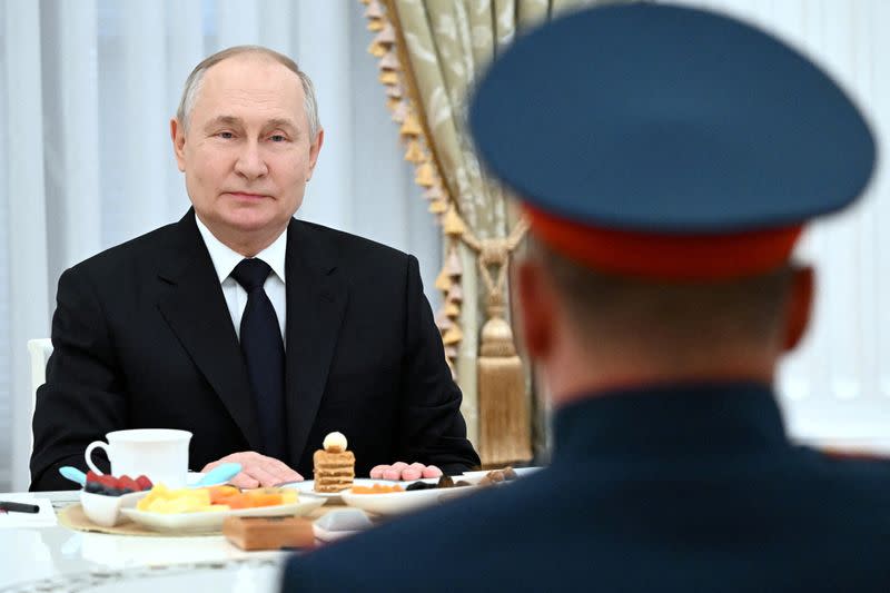 FILE PHOTO: Russian President Putin meets with servicemen involved in Russia-Ukraine conflict, in Moscow