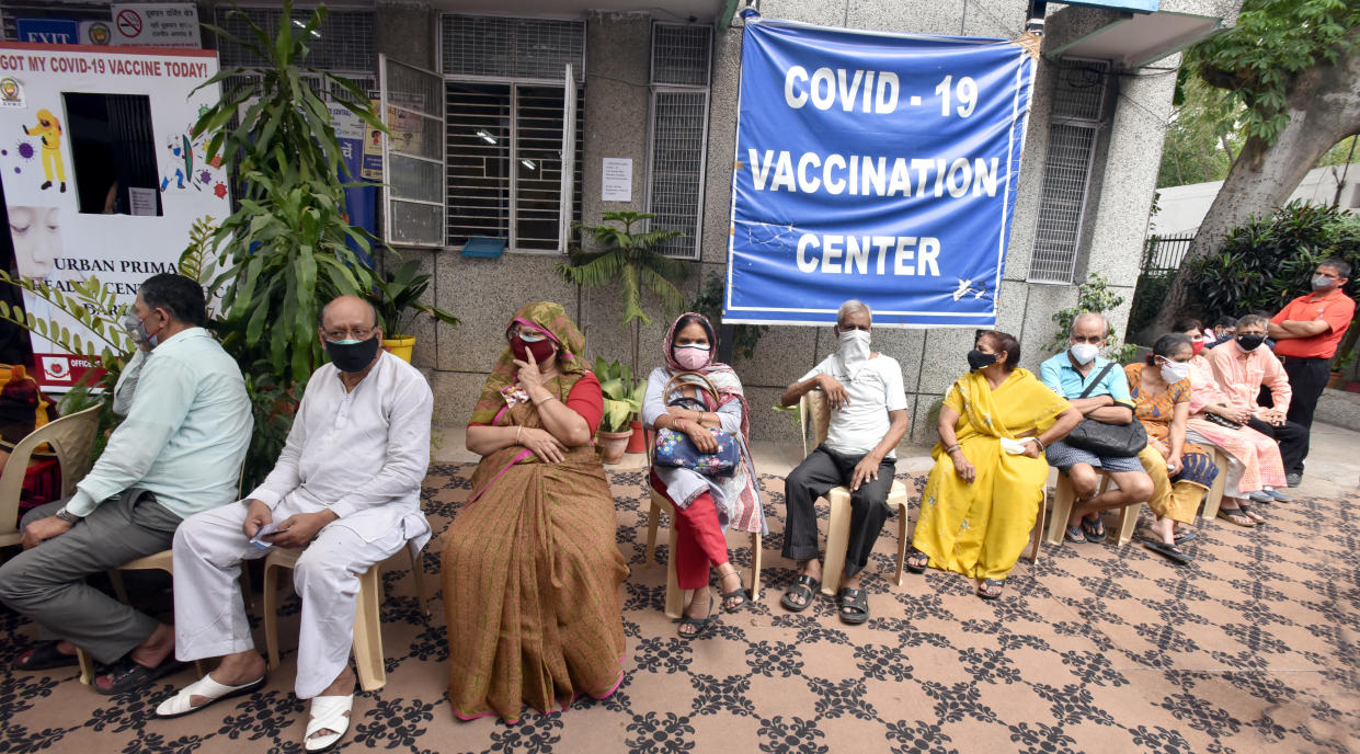 NEW DELHI, INDIA - MAY 10: People Beneficiary ( Heavy Rush ) in the age group of 45 above waiting to get covax Covid vaccine at UPHC Darya Ganj on May 10, 2021 in New Delhi, India. (Photo by Sonu Mehta/Hindustan Times via Getty Images)