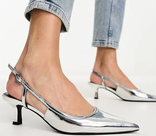 closeup of a woman's silver shoes
