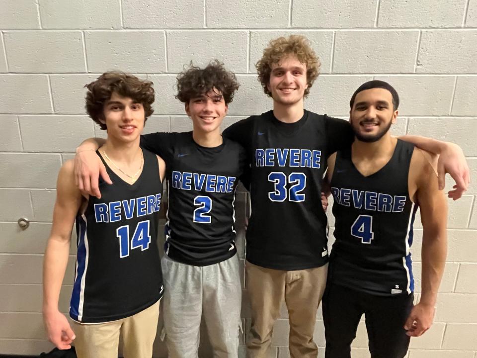 Revere basketball players, from left to right, Massimo Manera, Evan Oravecz, Greg Cochran and Carson Banks smile after a win over host Barberton on Friday, Dec. 8, 2023.