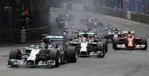 Mercedes Formula One driver Nico Rosberg of Germany (L) leads at the first curve of the first lap during the Monaco F1 Grand Prix in Monaco May 25, 2014. REUTERS/Max Rossi (MONACO - Tags: SPORT MOTORSPORT F1)