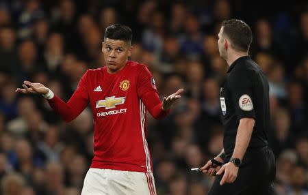 Britain Football Soccer - Chelsea v Manchester United - FA Cup Quarter Final - Stamford Bridge - 13/3/17 Manchester United's Marcos Rojo gestures towards referee Michael Oliver after a challenge with Chelsea's Diego Costa Action Images via Reuters / John Sibley Livepic