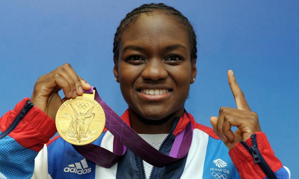 Nicola Adams with one of her boxing golds.