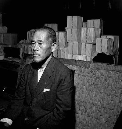 A Japanese man sits in a Buddhist temple in Hiroshima in front of ceremonial boxes containing ashes of victims of the blast. <a href="https://www.gettyimages.com/detail/news-photo/japanese-man-sits-in-a-buddhist-temple-in-front-of-news-photo/615307608?adppopup=true" rel="nofollow noopener" target="_blank" data-ylk="slk:Corbis Historical via Getty Images;elm:context_link;itc:0;sec:content-canvas" class="link ">Corbis Historical via Getty Images</a>