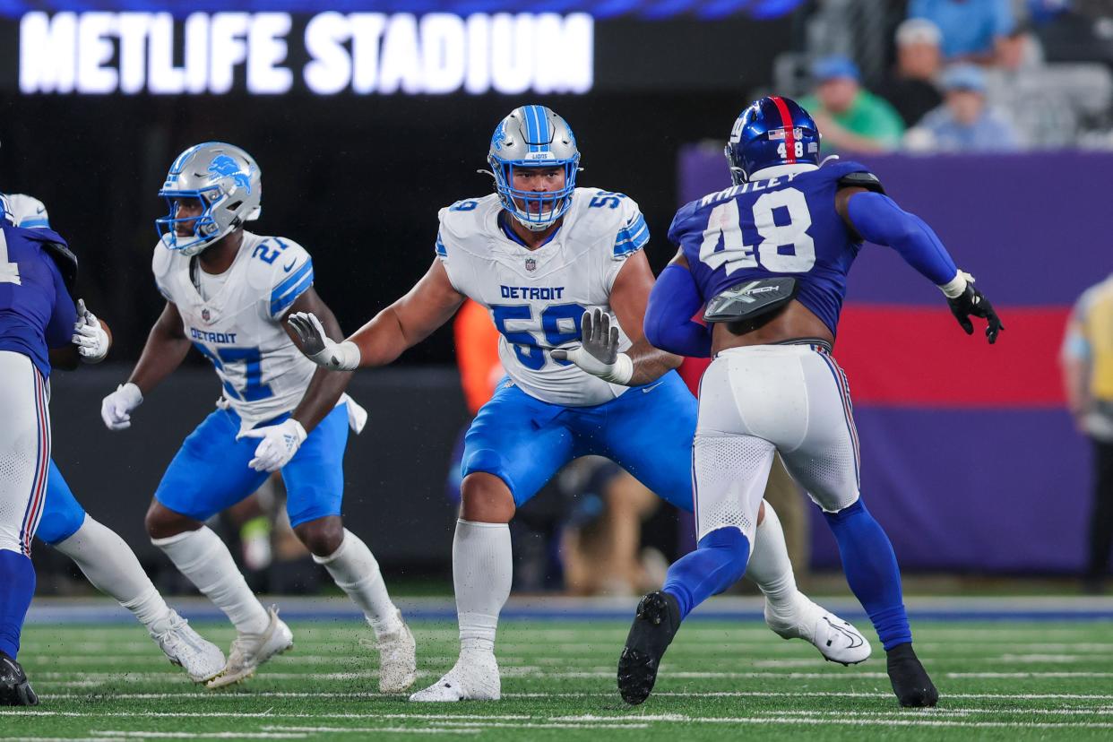 Detroit Lions offensive tackle Giovanni Manu (59) prepares for the rush during the Lions' preseason game against the New York Giants on Aug. 8, 2024 at MetLife Stadium. Scott Rausenberger, USA TODAY Sports