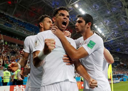 Soccer Football - World Cup - Round of 16 - Uruguay vs Portugal - Fisht Stadium, Sochi, Russia - June 30, 2018 Portugal's Pepe celebrates scoring their first goal with team mates. REUTERS/Jorge Silva