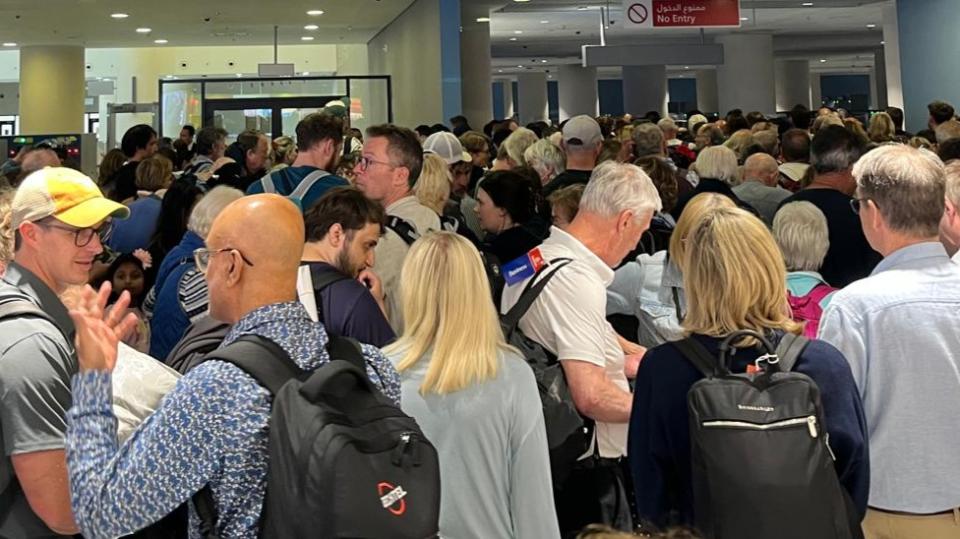 Passengers keep arriving at the World Central airport