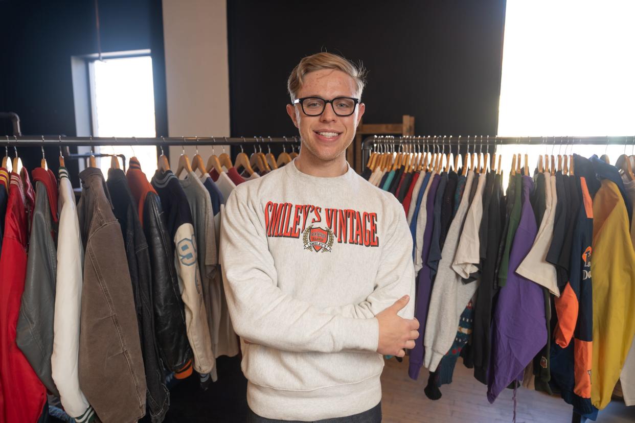 Ryan Smiley, owner of Smiley's, poses Friday, Jan. 21, 2022, inside of his new storefront location in Rockford.