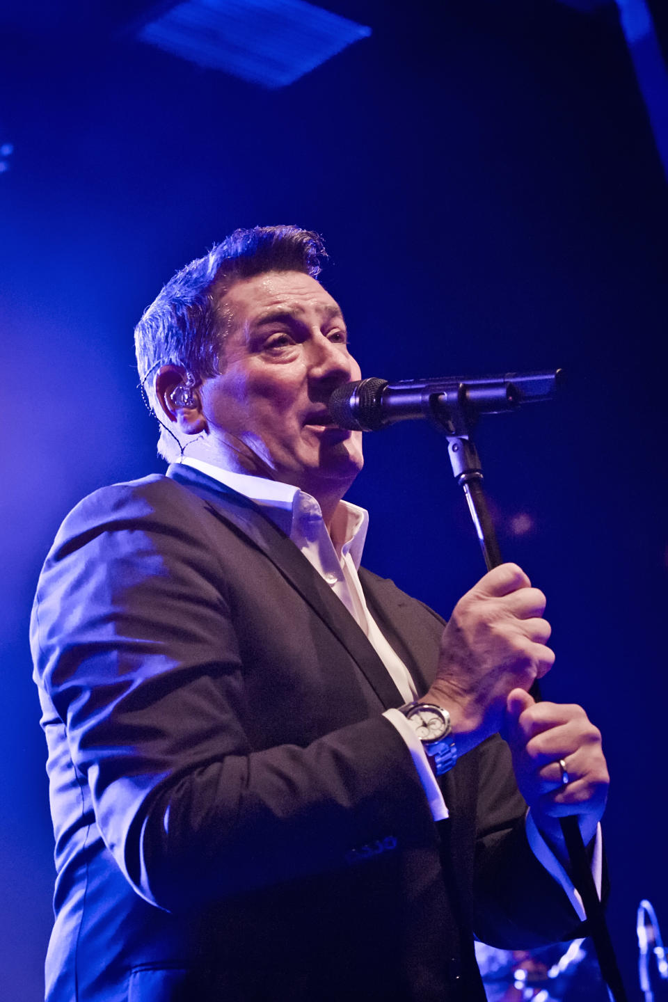 BERLIN, GERMANY - NOVEMBER 08: British singer Tony Hadley performs live on stage during a concert at the Columbia Theater on November 8, 2019 in Berlin, Germany. (Photo by Frank Hoensch/Redferns)