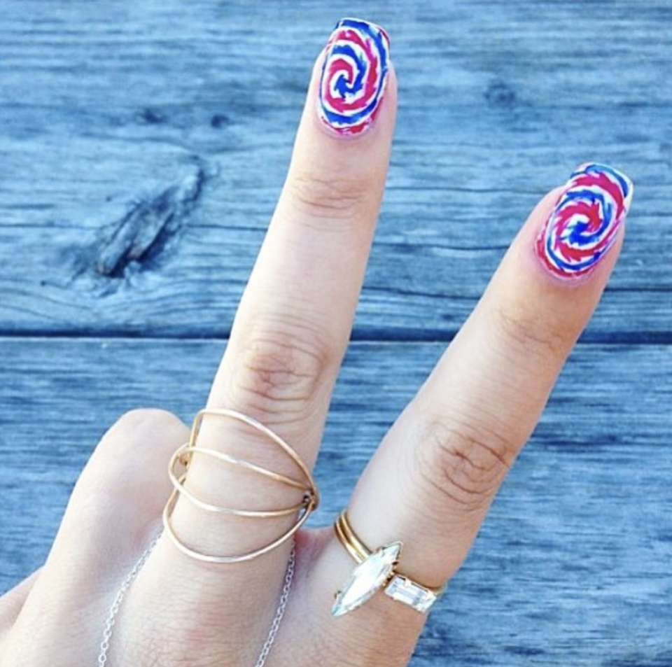 <p>Show your 'Merica pride with these playful—and very on-trend—tie-dye nails. </p><p><a class="link " href="https://www.amazon.com/Sally-Hansen-Effects-Polish-Tie-Dye/dp/B008LF8WEM/?tag=syn-yahoo-20&ascsubtag=%5Bartid%7C10072.g.27727694%5Bsrc%7Cyahoo-us" rel="nofollow noopener" target="_blank" data-ylk="slk:SHOP POLISH STRIPS;elm:context_link;itc:0;sec:content-canvas">SHOP POLISH STRIPS</a></p>