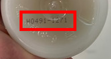 Lot codes of affected products can be identified on the bottom or side of the bottle in black type, as seen in the red box.