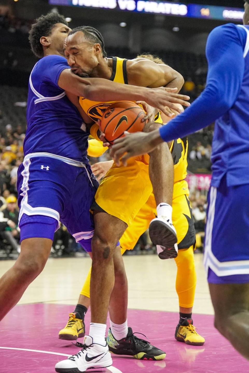 Missouri Tigers guard Tamar Bates pulls down a rebound against Seton Hall during Sunday’s game at T-Mobile Center.