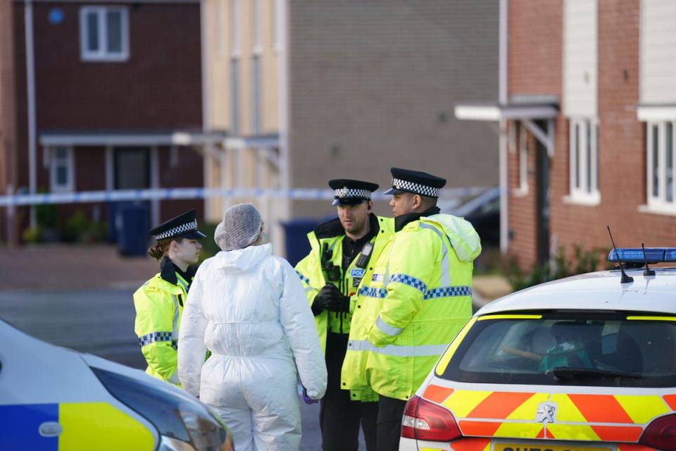 Police and forensics at the scene in Meridian Close, Bluntisham, Cambridgeshire, where police found the body of a 32-year-old man with a gunshot wound on Wednesday evening  (PA Wire)