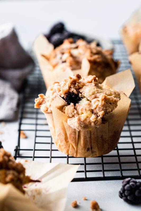 <p>The bakery-style blackberry muffins are bursting with blackberries and topped with a cinnamon-cardamom crumble topping.</p><p><strong>Get the recipe: <a href="https://www.platingsandpairings.com/the-best-blackberry-muffins-with-crumble-topping/" rel="nofollow noopener" target="_blank" data-ylk="slk:Blackberry Crunch Muffins;elm:context_link;itc:0;sec:content-canvas" class="link rapid-noclick-resp">Blackberry Crunch Muffins</a></strong></p>