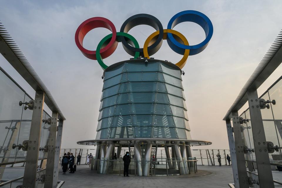 The Olympic Rings are seen at the top of the Olympic Tower in Beijing, China