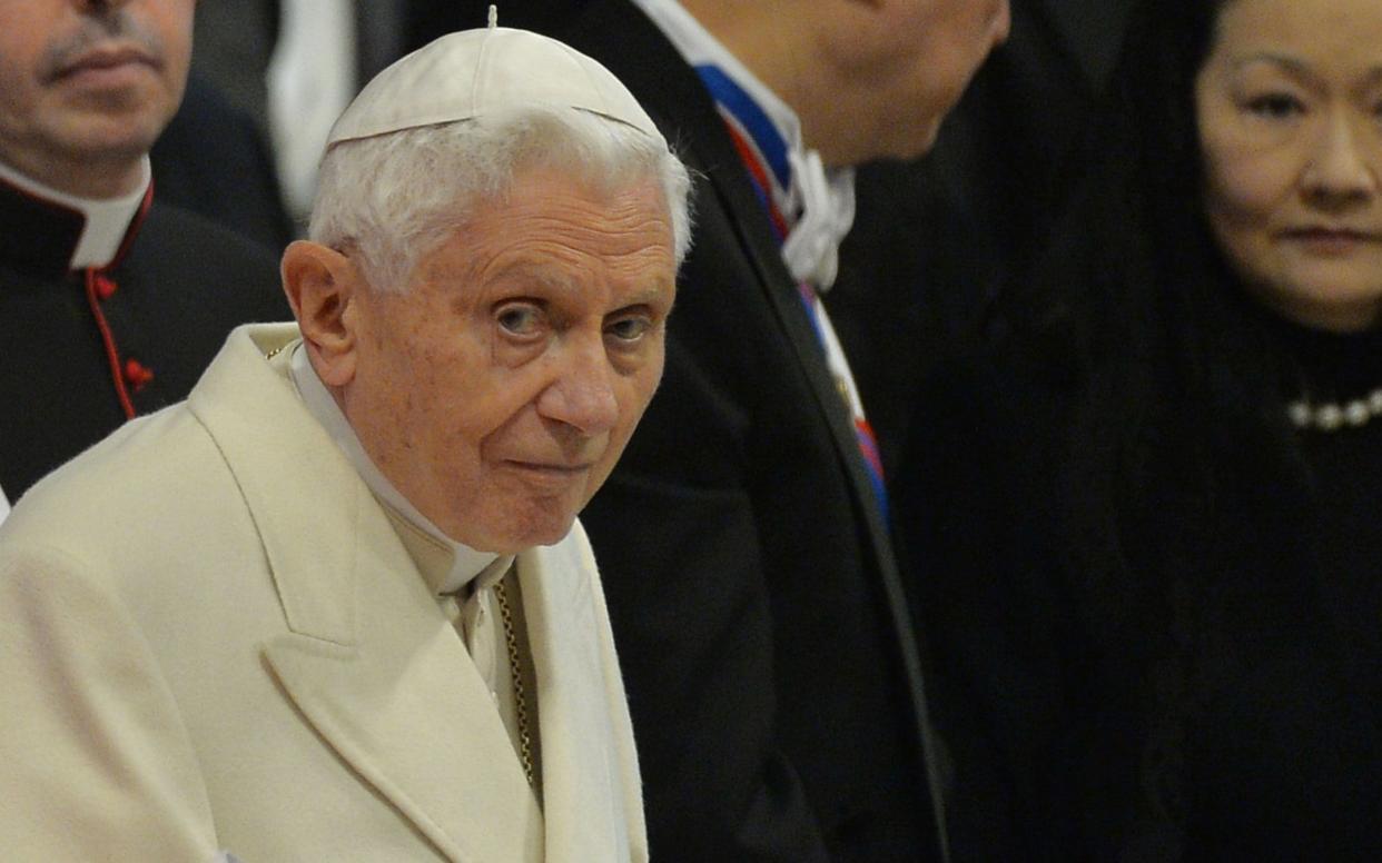 Pope Emeritus Benedict XVI at a consistory for the creation of new cardinals on February 14, 2015 at St. Peter's Basilica in the Vatican.  - AFP