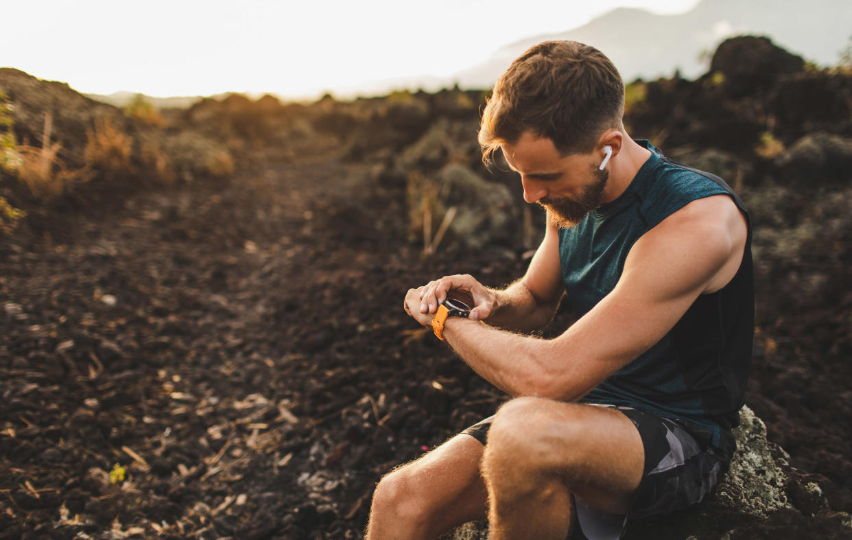  Runner with smartwatch and earbuds 