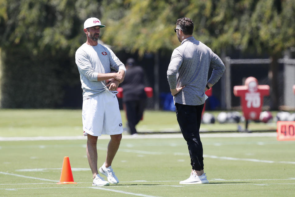 San Francisco 49ers head coach Kyle Shanahan watch players workout during NFL football practice in Santa Clara, Calif., Wednesday, June 2, 2021. (AP Photo/Josie Lepe)