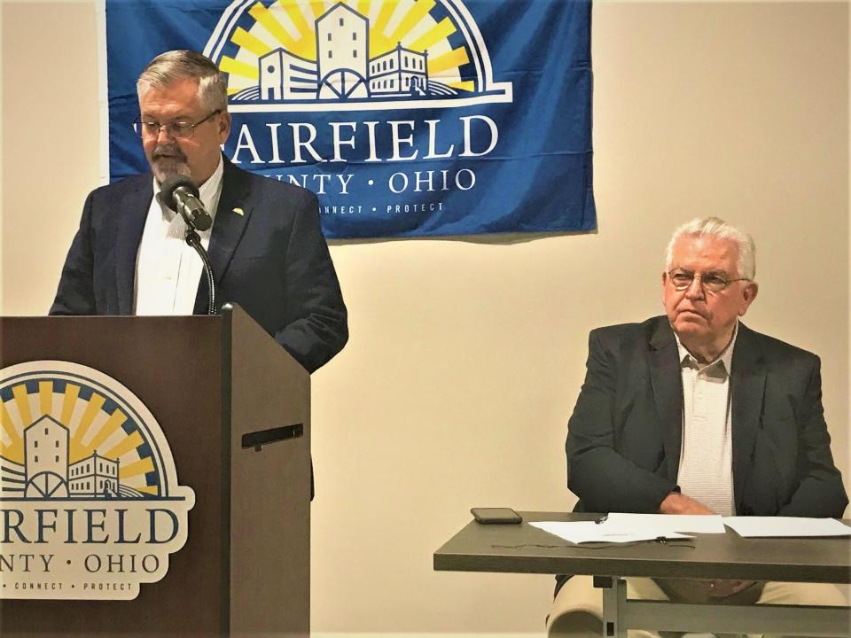 Fairfield County commissioner Jeff Fix (left) talks about the more than $30 million in American Rescue Plan money the county commissioners awarded to numerous local projects Tuesday as commissioner Dave Levacy looks on.