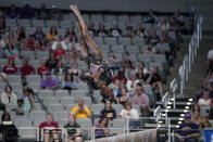 LSU's Kiya Johnson competes on the beam during the NCAA women's gymnastics championships in Fort Worth, Texas, Thursday, April 18, 2024. (AP Photo/Tony Gutierrez)