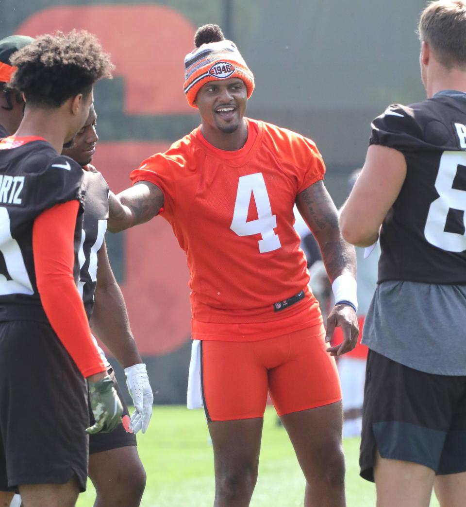 Cleveland Browns quarterback Deshaun Watson talks with the offense in the huddle during OTA workouts on Wednesday, June 8, 2022 in Berea.