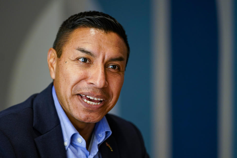 Republican candidate for Indiana Secretary of State Diego Morales speaks during an interview in Indianapolis, Tuesday, Sept. 20, 2022. (AP Photo/Michael Conroy)