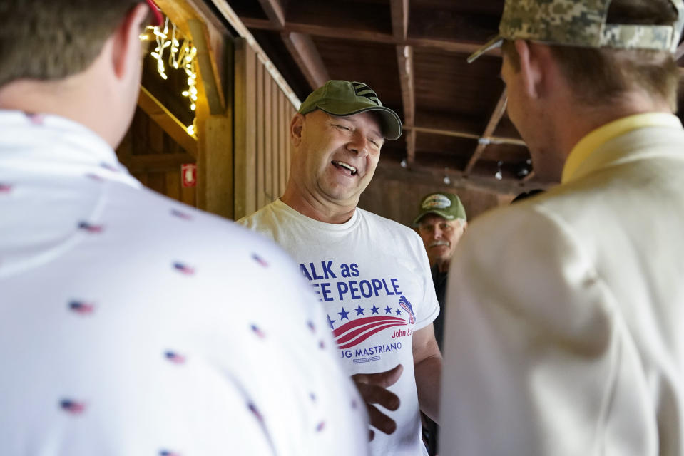 Pennsylvania state Sen. Doug Mastriano, R-Franklin,a Republican running for Governor of Pennsylvania, meets supporters at a campaign stop Tuesday, May 10, 2022, in Portersville, Pa. Republicans are openly worrying that Mastriano, a leading candidate in the crowded GOP field in the race, is unelectable in the fall general election and will fumble away an opportunity for the party to take over the battleground state's executive suite. (AP Photo/Keith Srakocic)