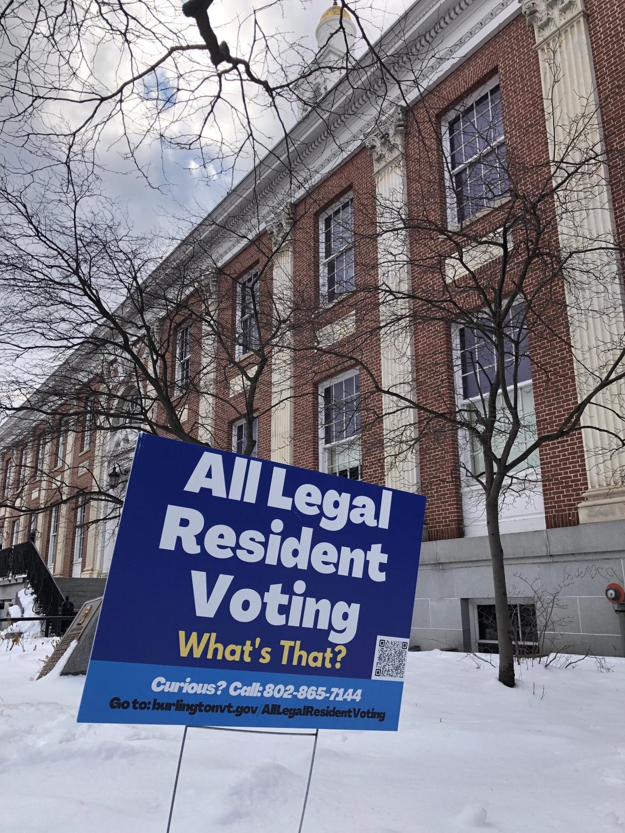 A sign planted in front of Burlington City Hall on Saturday, Jan. 28, 2023, supports a measure to allow all legal residents of Burlington to vote, regardless of their citizenship.