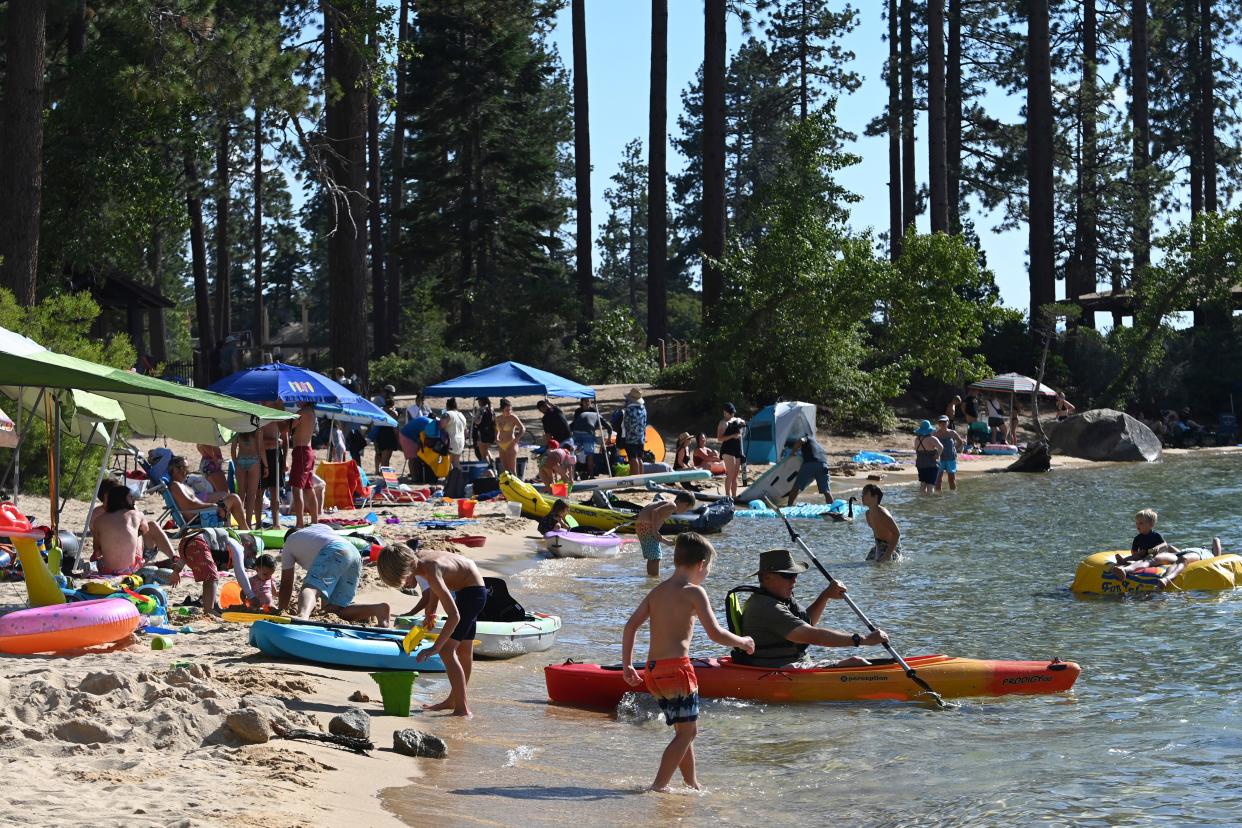 Sand Harbor is packed with visitors at Lake Tahoe Nevada State Park in Incline Village, Nevada on July 17, 2023.