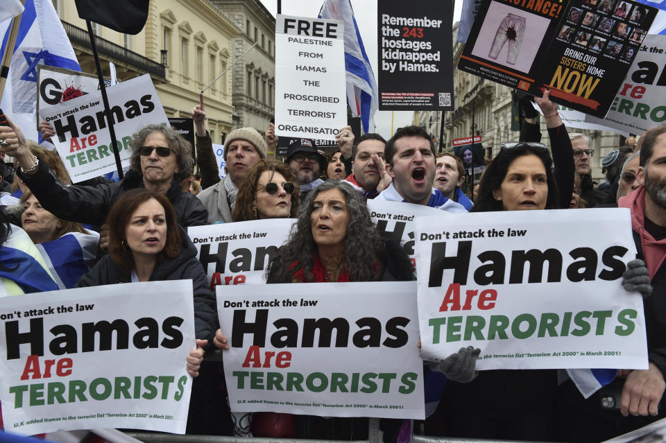 Pro-Israeli protesters take part in a demonstration along the route of the Pro-Palestinian march in London, Saturday, April 27, 2024. (AP Photo/Thomas Krych)