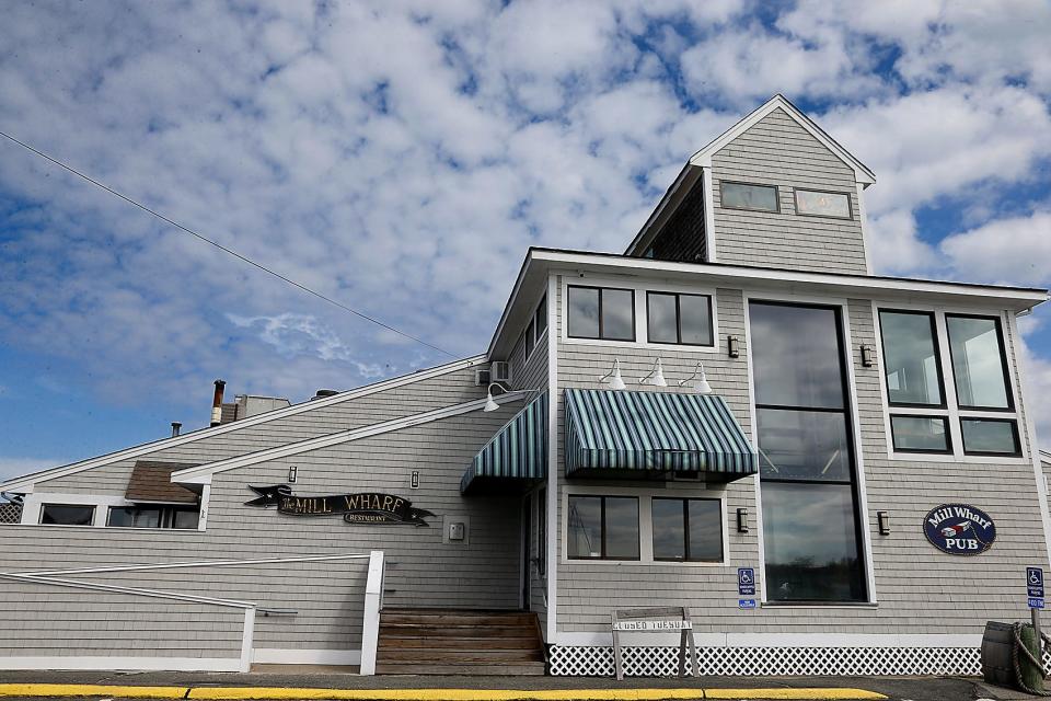 The Mill Wharf Restaurant on Scituate Harbor was recently sold by Bob Warner to the father-son team of Doug Traina and Dan Groom-Traina.