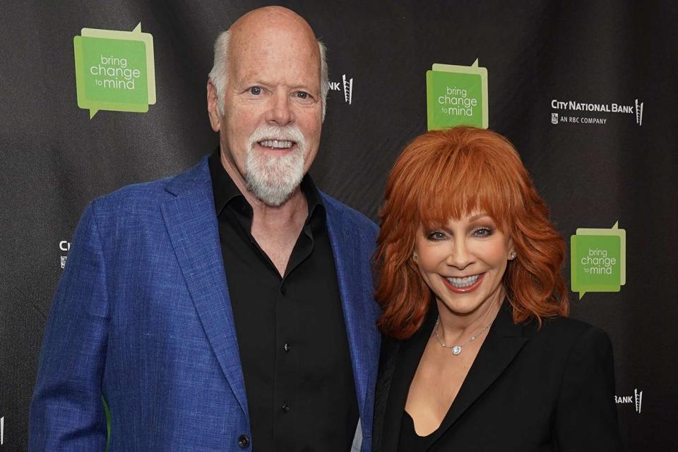 <p>Kristin Callahan/Shutterstock</p> Rex Linn (left) and Reba McEntire in New York City on Oct. 9, 2023