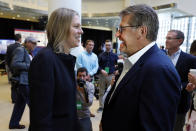 UConn women's basketball coach Geno Auriemma, right, talks with Big East Commissioner Val Ackerman before the announcement that the University of Connecticut is re-joining the Big East Conference, at New York's Madison Square Garden, Thursday, June 27, 2019. (AP Photo/Richard Drew)