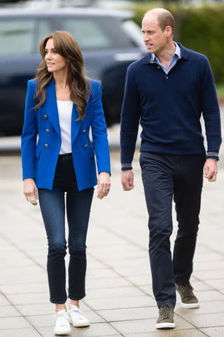 <p>Samir Hussein/WireImage</p> Kate Middleton and Prince William visit SportsAid at Bisham Abbey National Sports Centre on October 12.