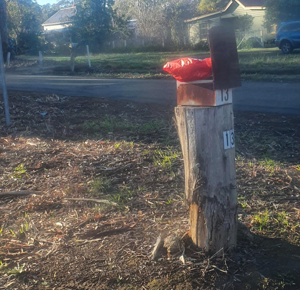 The resident's parcel was left sitting on top of the letterbox, in full view of the street. Source: Facebook