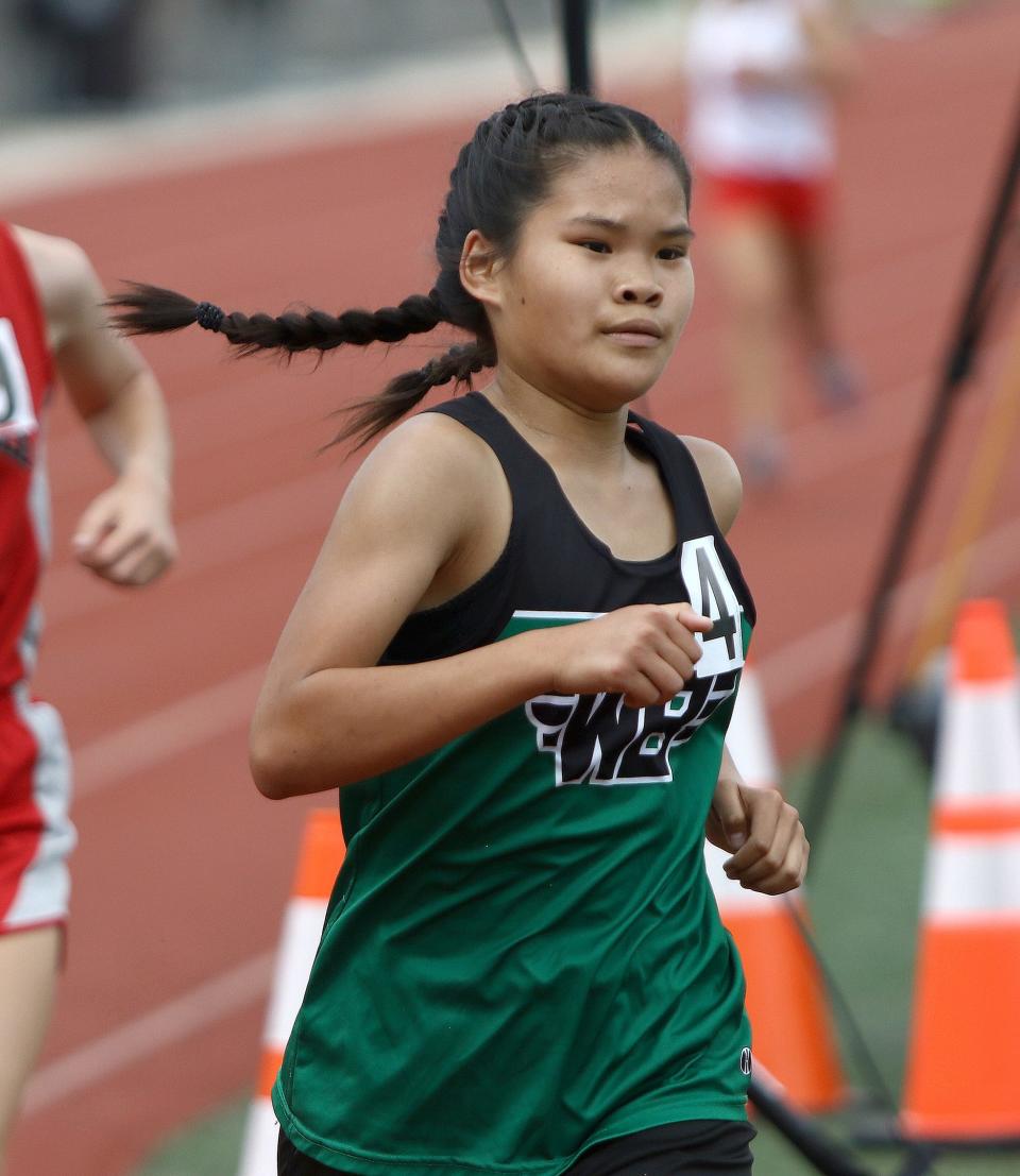 West Branch's Clarice Martin during the girls 1600-meter final at the Division II district track and field finals at Salem Sebo Stadium on Saturday, May 21, 2022.