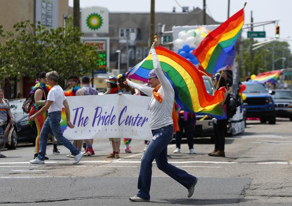 Spectators and participants celebrate during the Pride parade in Asbury Park in 2019.