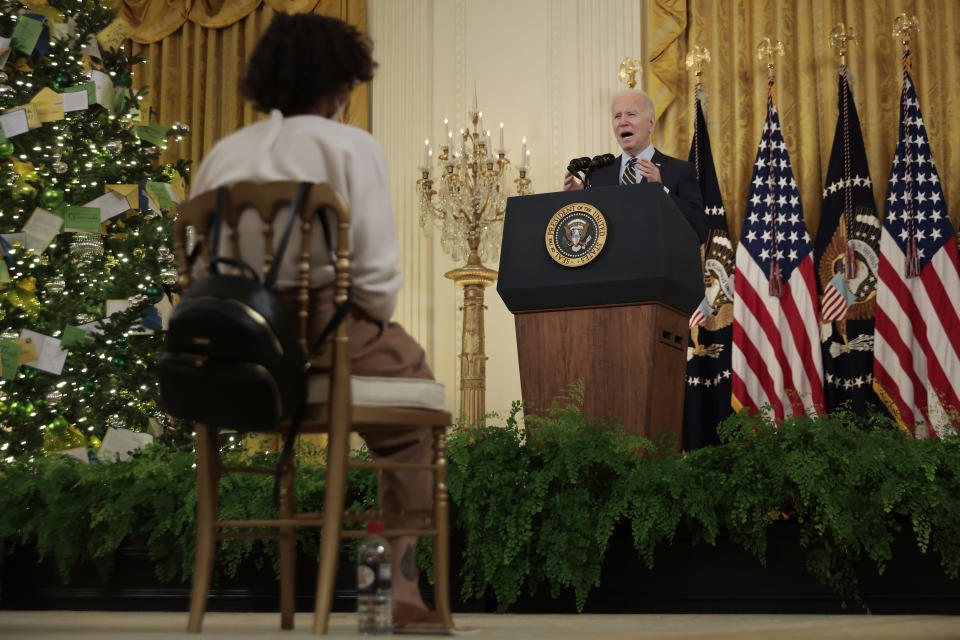 WASHINGTON, DC - DECEMBER 06: With the East Room deocrated for the holidays, U.S. President Joe Biden delivers remarks about the Build Back Better legislation's new rules around prescription drug prices at the White House on December 06, 2021 in Washington, DC. According to the White House, the legislation will lower the costs of prescription drugs by giving negotiation powers to Medicare, imposing a tax penalty if drug companies increase prices faster than inflation, lowering insulin prices to $35 a month for people with diabetes and other regulations. (Photo by Chip Somodevilla/Getty Images)