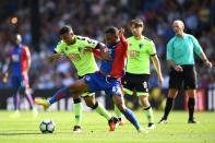 Football Soccer Britain - Crystal Palace v AFC Bournemouth - Premier League - Selhurst Park - 27/8/16 Crystal Palace's Jason Puncheon in action with Bournemouth's Joshua King Action Images via Reuters / Tony O'Brien Livepic EDITORIAL USE ONLY. No use with unauthorized audio, video, data, fixture lists, club/league logos or "live" services. Online in-match use limited to 45 images, no video emulation. No use in betting, games or single club/league/player publications. Please contact your account representative for further details.