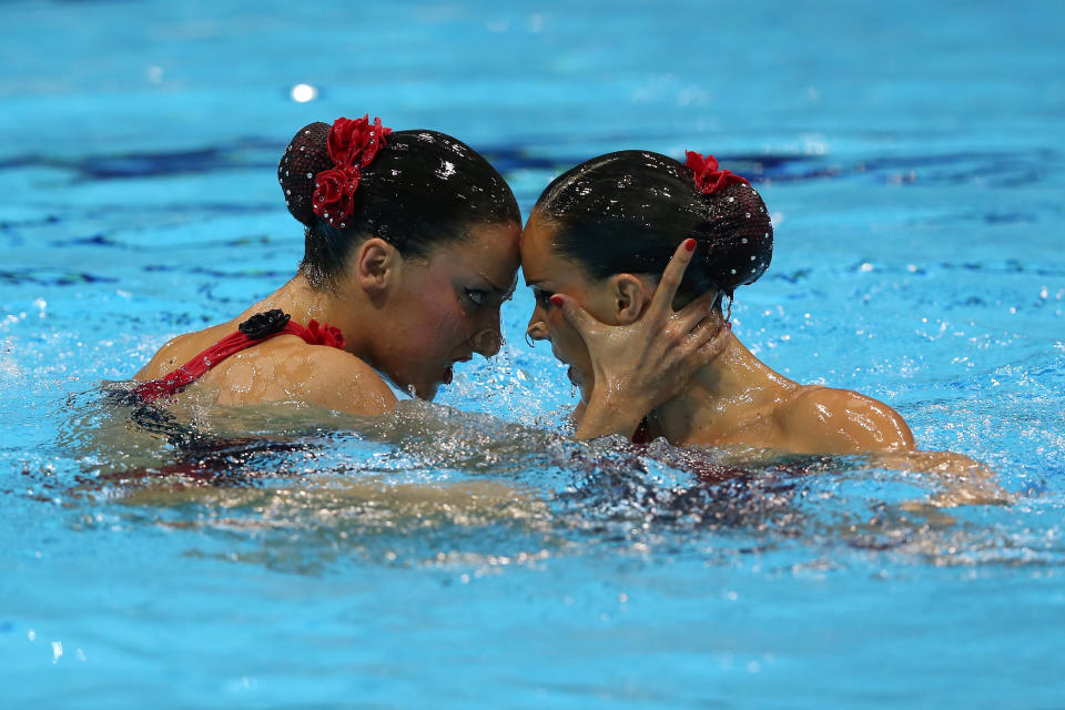 LONDON, ENGLAND - AUGUST 07: Ballestero Carbonell and Andrea Fuentes Fache of Spain compete in the Women's Duets Synchronised Swimming Free Routine Final on Day 11 of the London 2012 Olympic Games at the Aquatics Centre on August 7, 2012 in London, England. (Photo by Clive Rose/Getty Images)