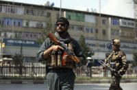 <p>Afghan security personnel arrive at the site of a suicide bombing in Kabul, Afghanistan, Tuesday, Aug. 29, 2017. (Photo: Rahmat Gul/AP) </p>